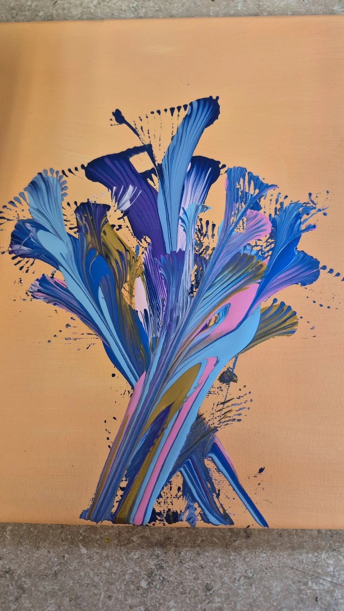 Acrylic paint pour artwork by a Genesis Prep student