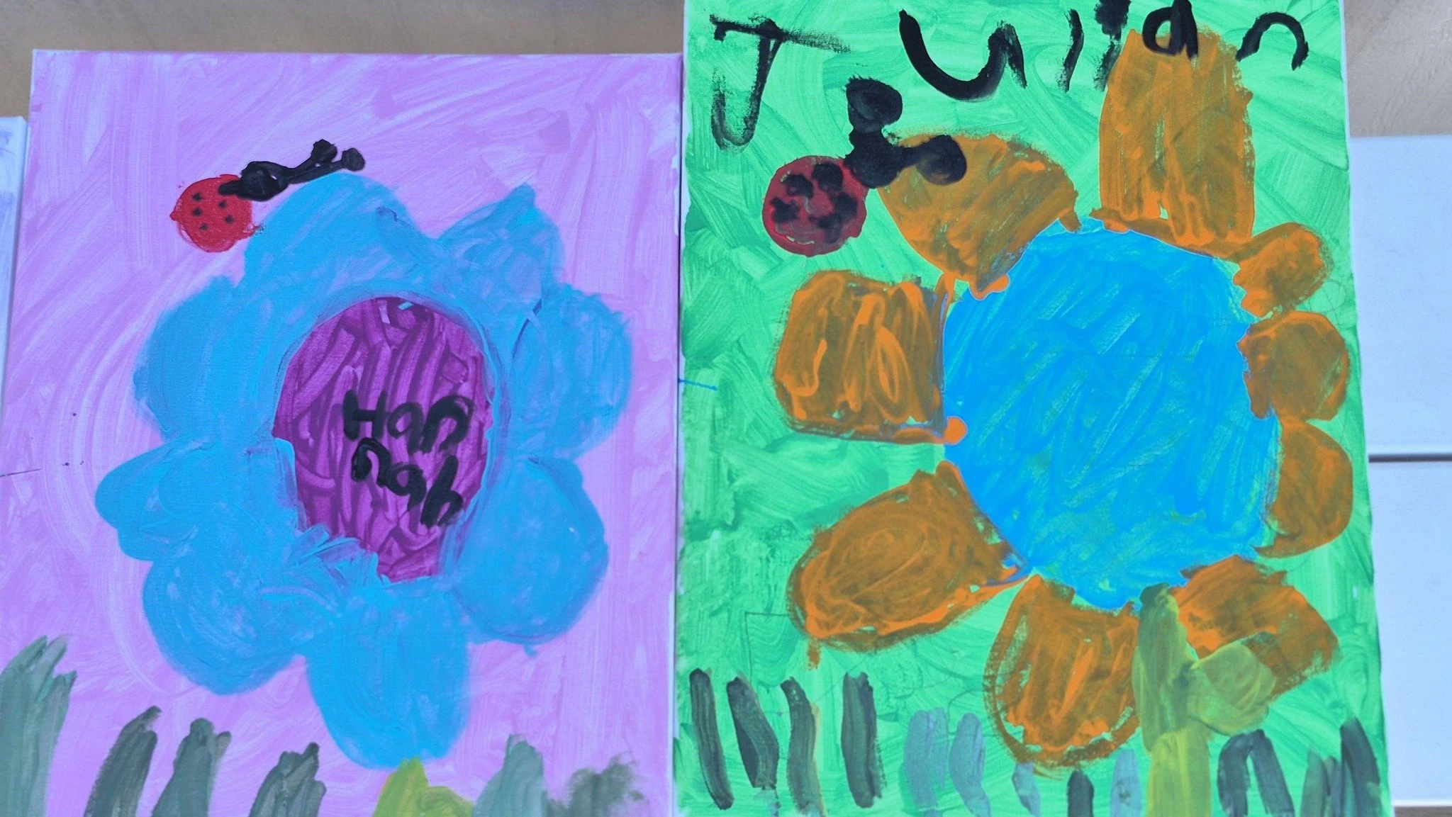 Student flower paintings at Genesis Prep