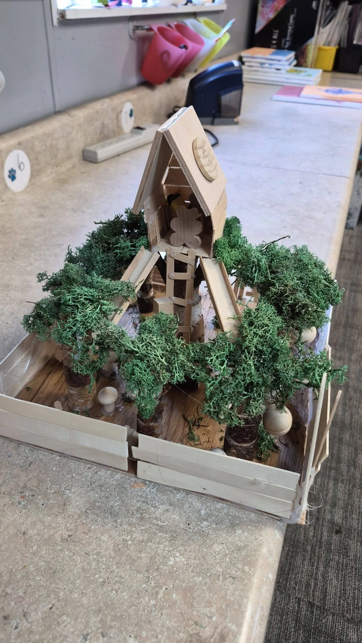 Mixed media treehouse diorama by Genesis Prep students