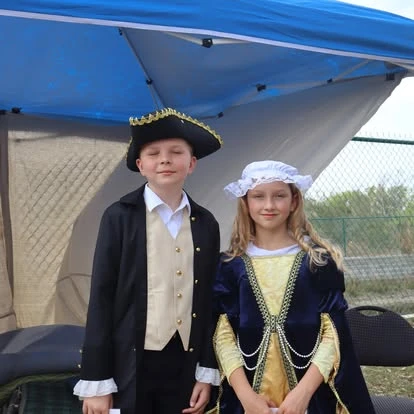 Genesis Prep students in Colonial Day costumes